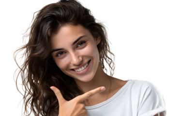 Portrait of a smiling young woman pointing to the sides on a white background.