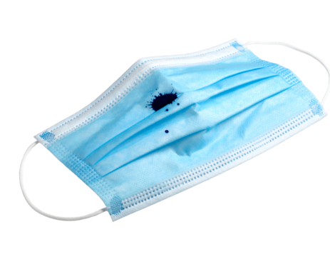 Used blue medical face mask with dark ink stains and elastic earloops on isolated background
