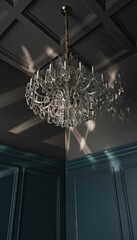 Luxurious Crystal Chandelier With Intricate Details Casts Dramatic Shadows On An Ornate Dark Gray Ceiling And Walls