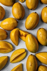&ldquo;Fresh yellow mango sliced neatly on clean white studio surface high detail premium fruit photography natural lighting commercial food image high resolution texture clarity tropical fruit concept mini
