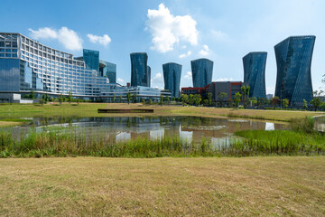 Park lawns and modern office buildings in technology parks