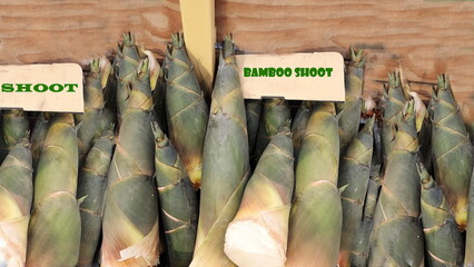 Freshly picked bamboo shoots from the farm are on sale in the shop. The bamboo shoots are displayed...