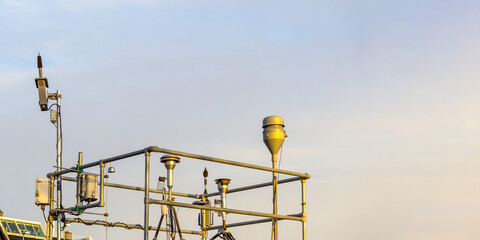 Urban Air Quality Monitoring Station with Weather Sensors on Metal Gantry