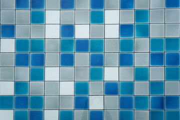 Blue mosaic pool tiles background