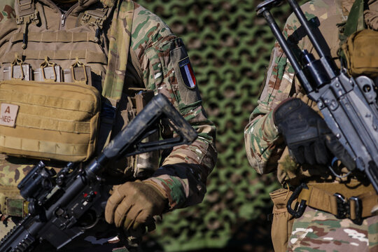 French soldier in combat gear during a military exercise.