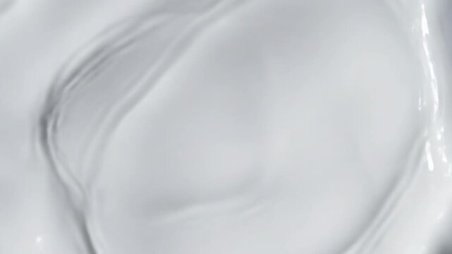 Creamy Surface: An inviting visual of a smooth, glossy cream. This photograph encapsulates the gentle textures and subtle luminosity, evoking a sense of purity and smoothness.