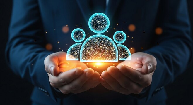 Businessman holding glowing digital team icons in hands.
