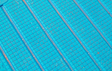 Blue ridged surface texture with square grid and diagonal grooves