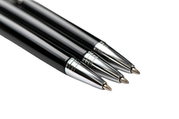 Close-up of three black ballpoint pens, angled, showing metal tips