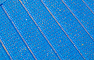 Blue ridged surface texture with square grid and diagonal grooves