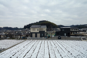 View of landscape Yufuin village in the winter after snow fall