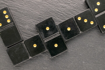 Old dice for playing dominoes, top view, macro.