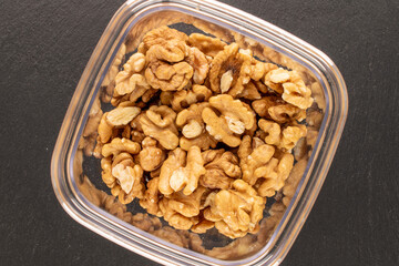 Peeled walnut, top view, macro.