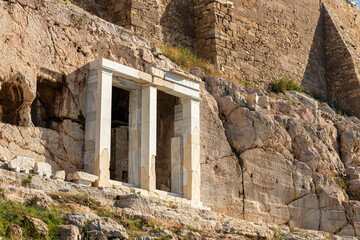 Athens, Greece. The Choregic Monument of Thrasyllos, an ancient Greek victory monument dedicated to theatrical performance, stands on the slopes below the Acropolis, near Panagia Speliotissa