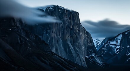 El Capitan Yosemite National Park landscape for adventure travel or conservation promotion. Majestic mountain peak with clouds, ideal for inspirational outdoor campaign visuals.