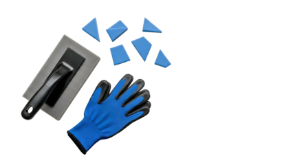 Construction worker's blue glove and grout float tool with broken blue tile pieces on a clean black surface for DIY home improvement projects