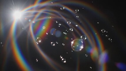 Spectacular rainbow light dancing with water droplets in air, creating a mesmerizing and ethereal effect perfect for inspiring creativity and wonder