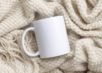 White coffee mugs on beige plaid top view, boho POD design mockup. Christmas holiday time