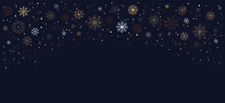 Winter banner with snowflakes, sparkling pollen and falling snow on dark blue background. Luxurious festive background perfect for Christmas, New Year, and seasonal projects