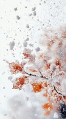 Close-up of orange autumn leaves on branches, dusted with snow and ice, with falling snowflakes creating a winter scene.
