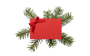 Festive red card with ribbon on evergreen boughs for holiday greetings