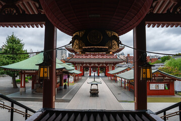 View from within Senso ji in Asakusa, Tokyo, past a large lantern toward Nakamise dori and the...