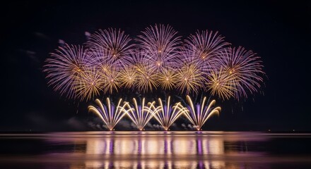 Spectacular firework display over serene waters at night