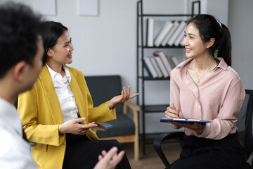 Team collaborating in modern office. Professionals engaging in a lively discussion during a team...