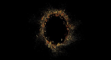 An abstract image of golden particles arranged in a ring on a black background, with the feeling of...