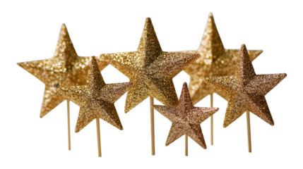 Glittery gold star toppers arranged in collection isolated on white background