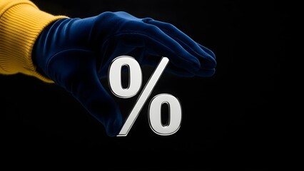 A person's hand in a luxurious blue velvet glove holds a white percentage symbol against a solid black background, representing financial concepts