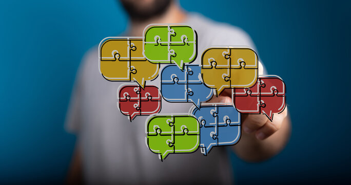 Concept of communication, teamwork, and problem-solving. Colorful puzzle pieces form speech bubbles to symbolize discussion.