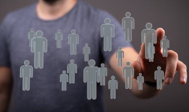 Man touching digital human icons. Represents connection, networking, and social media. Ideal for business, tech - Powered by Adobe