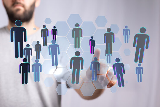 Man touching virtual human icons, representing technology, networking, global connection, and communication in