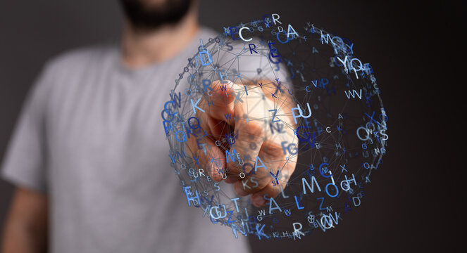 Close up of a man's finger interacting with a globe of letters representing global network and connection. Inte