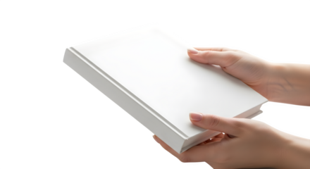 Hands holding a closed white book with a blank cover against a black background in a studio shot