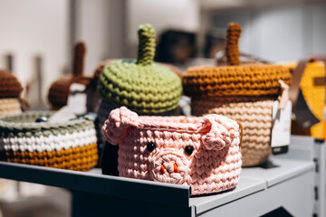 Assorted crochet and rope baskets for storage and home decor.