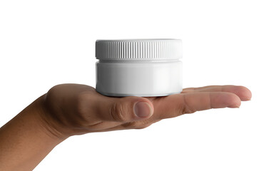 White cosmetic cream jar held in a hand, isolated on white background