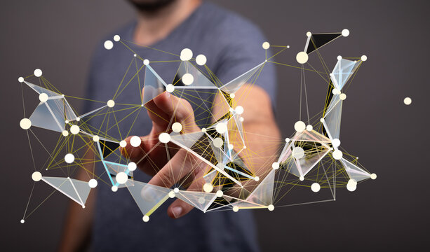 Abstract image of a hand interacting with a digital network. Perfect for technology, connection, and innovation concepts.