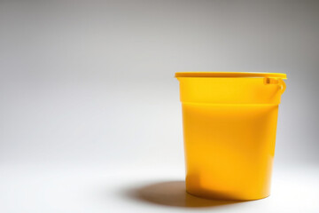 Simple Yellow Bucket, Bright Reflection