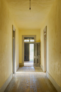 Interior view of a corridor in an abandoned building in Montana State Park.