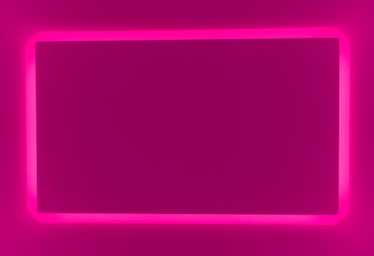 A glowing pink neon frame with rounded corners radiates against a matching pink background, creating a sleek, modern aesthetic. 