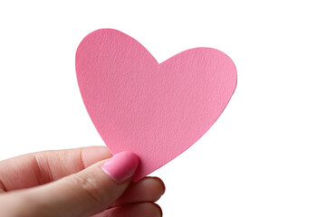 Fototapeta premium A pink heart-shaped cutout held by a hand