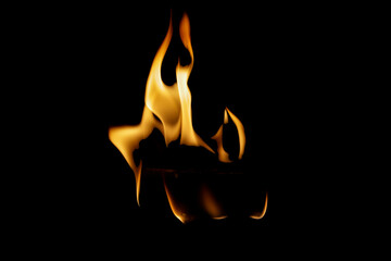 Intense Flames Dancing in the Dark on a Black Background