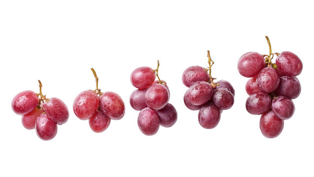 Close-up of fresh red grapes with water droplets isolated on a white background, vibrant and juicy fruit for healthy eating or food photography