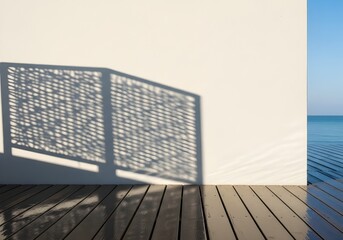 Minimalist seaside aesthetic with light and shadow play on wall creating calm atmosphere