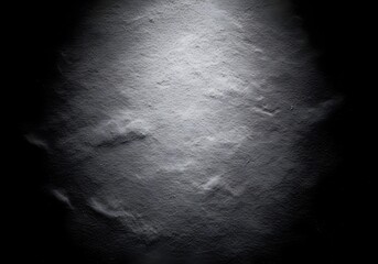 Monochrome Abstract Texture Background with Light Center and Dark Edges Showing Rough Surface