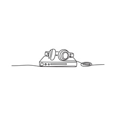 Minimalist line art of headphones resting on a music player