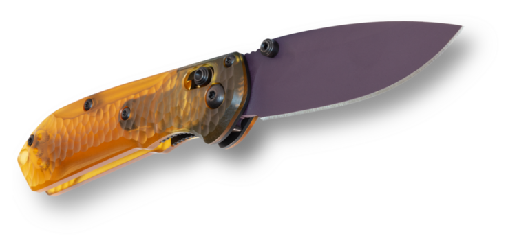 Folding knife with blade out coming toward viewer