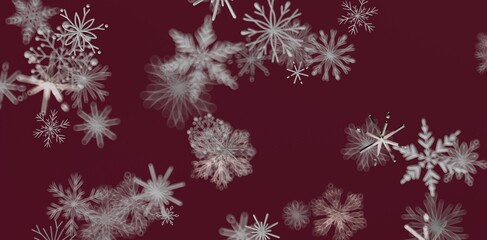 Elegant winter background featuring falling snowflakes with a burgundy backdrop, perfect for holiday greetings and festive d